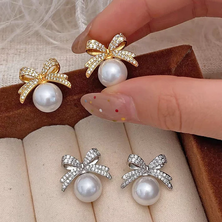 Bow-knot Pearl - Earrings - Hover